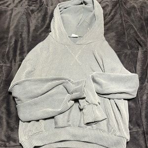 Light grey ish blue lightweight sweatshirt with hood and front pocket